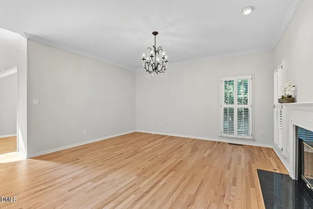 a living room with furniture fireplace and flat screen tv