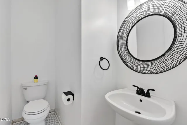 a view of room with hardwood floor and cabinet