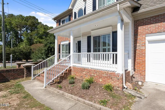 a front view of a house with porch