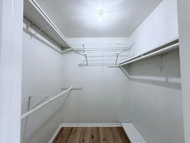 a view of a room with racks on the wall