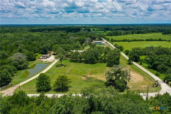 a view of a golf course with a lake