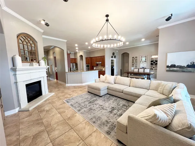 a room with gym equipment and a large window