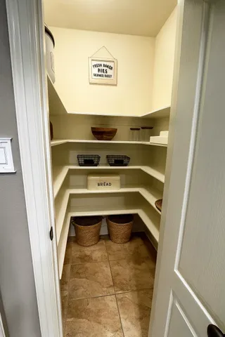 a kitchen with a sink stove and refrigerator