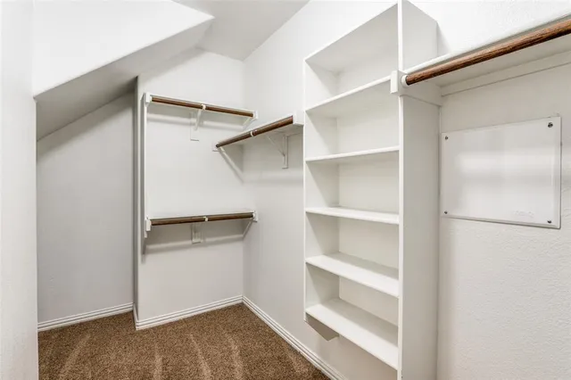 a storage room with wooden floor