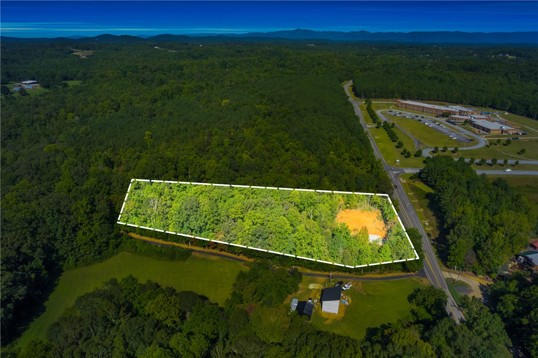 167 Cherokee Trail Easley, SC 29640 - Photo 9 of 18 Unleash your vision across this generously sized, tree-lined lot, ready for your dream home.