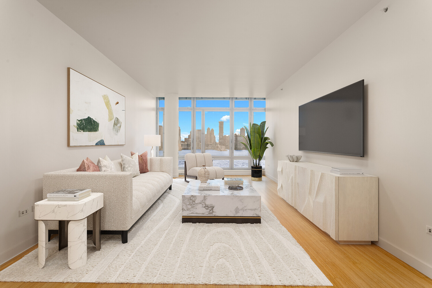 a living room with furniture and a flat screen tv