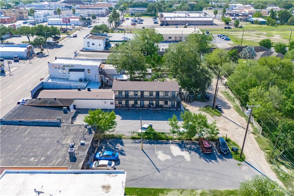 130 North Texas Avenue, Unit 4 Mercedes, TX 78570 - Photo 13 of 18 an aerial view of a house with garden space and street view