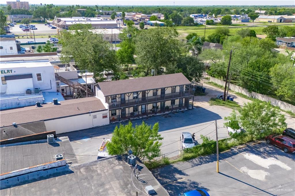 130 North Texas Avenue, Unit 4 Mercedes, TX 78570 - Photo 15 of 18 an aerial view of a house with garden space and street view