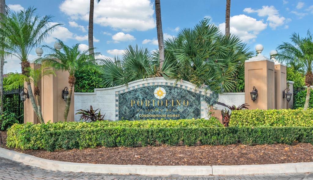 3779 Northwest Mediterranean Lane, Unit 207 Jensen Beach, FL 34957 - Photo 19 of 20 a view of a yard front of house