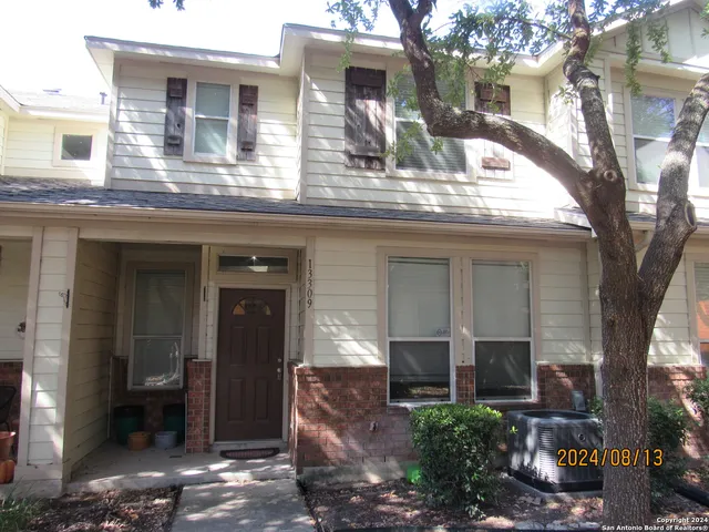 a view of a house with a porch