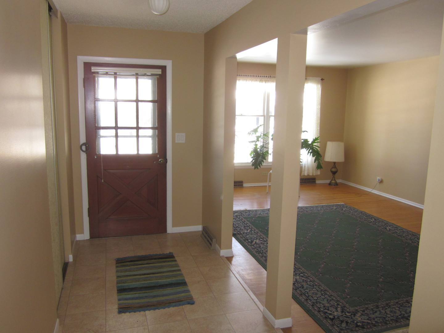511 Northgate Road Lindenhurst, IL 60046 - Photo 3 of 19 a view of a room with wooden floor and chair