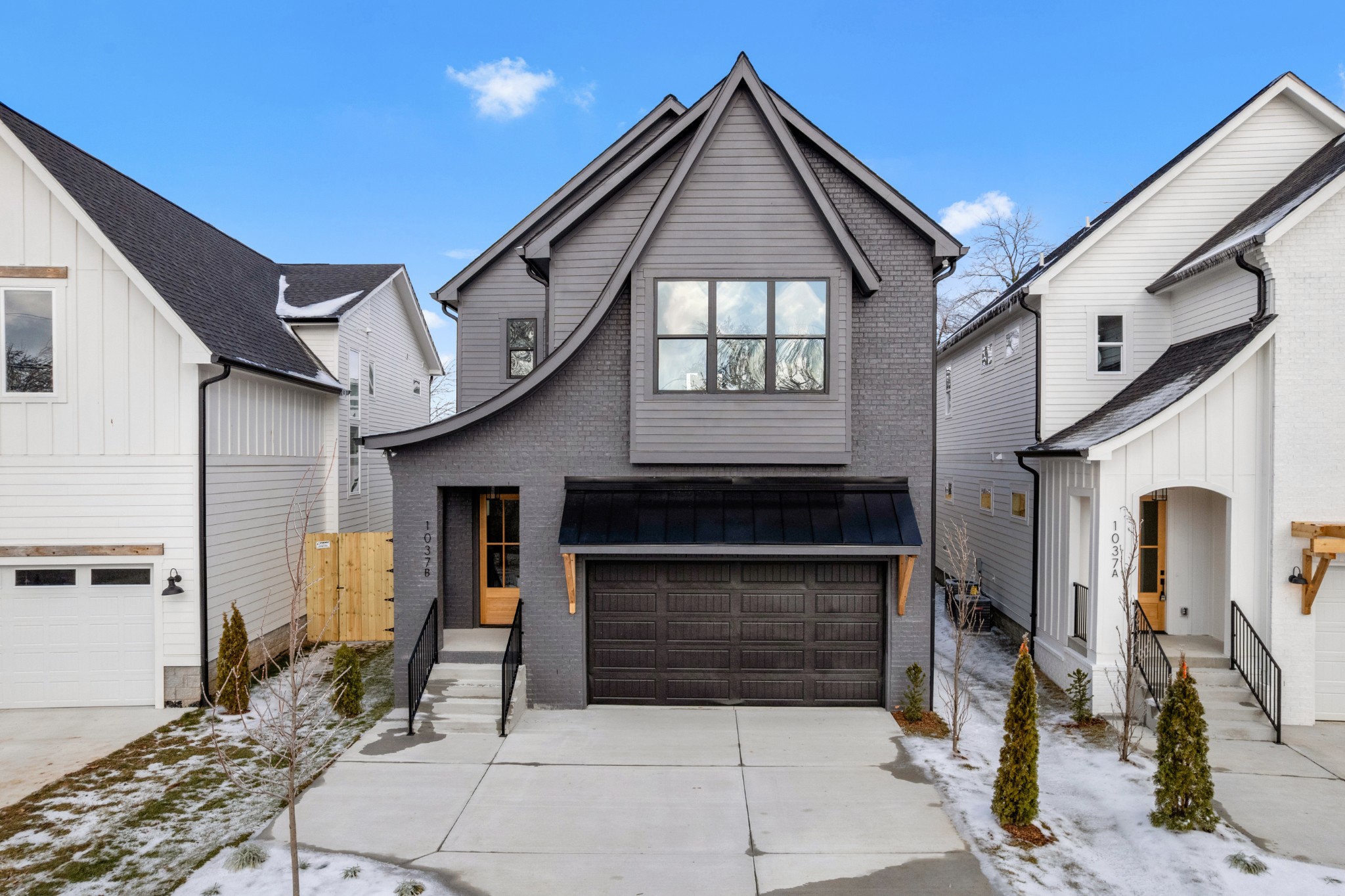 a front view of a house with stairway