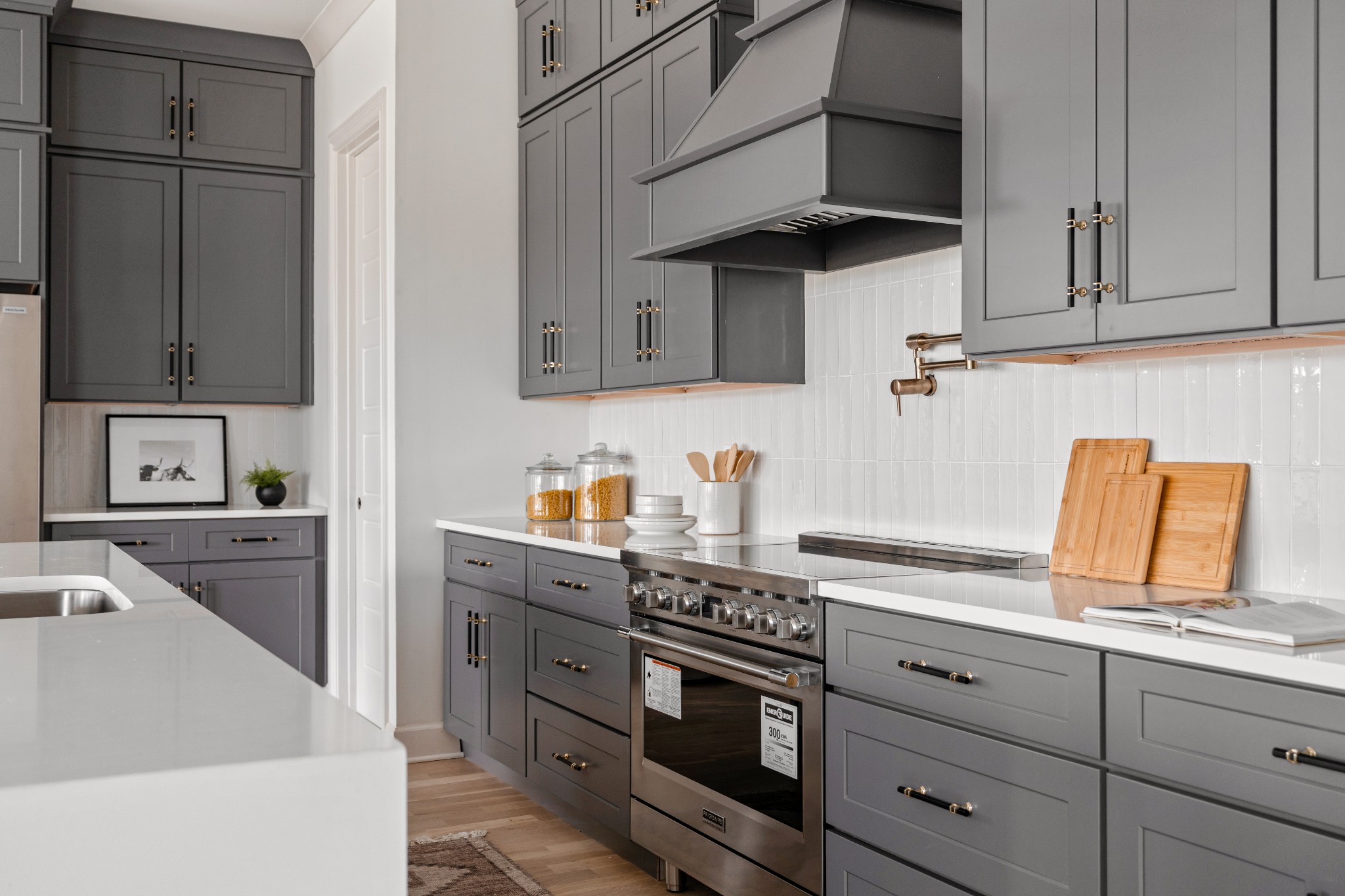 1037 Mitchell Road, Unit B Nashville, TN 37206 - Photo 11 of 50 a kitchen with stainless steel appliances granite countertop a sink and a stove