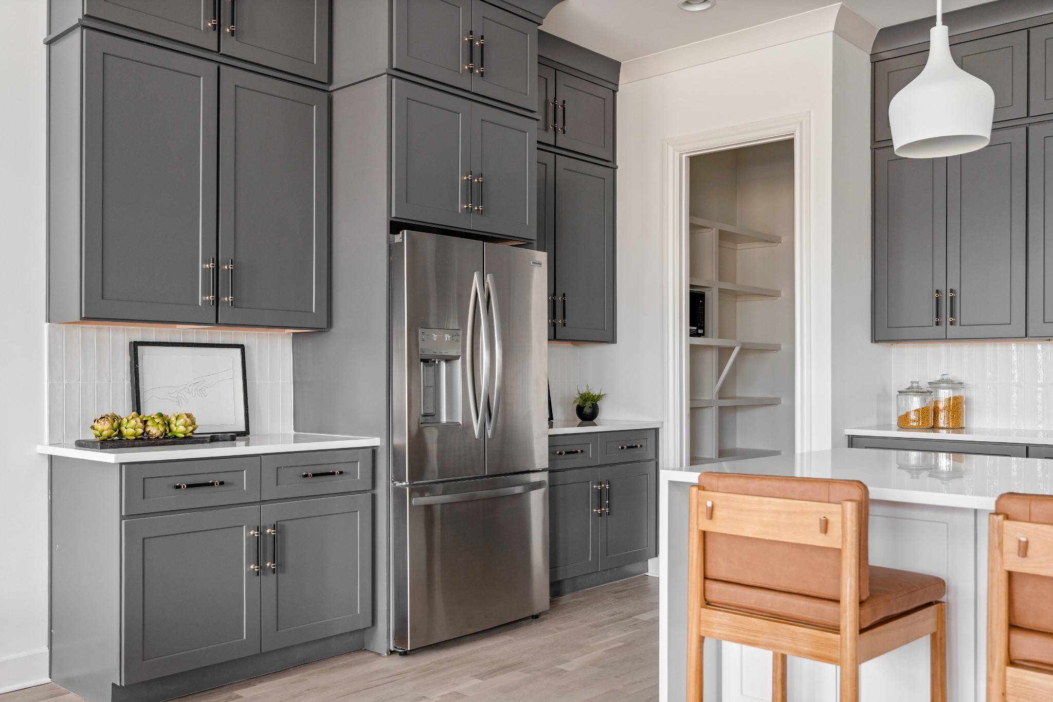 1037 Mitchell Road, Unit B Nashville, TN 37206 - Photo 14 of 50 a kitchen with stainless steel appliances a refrigerator sink and cabinets
