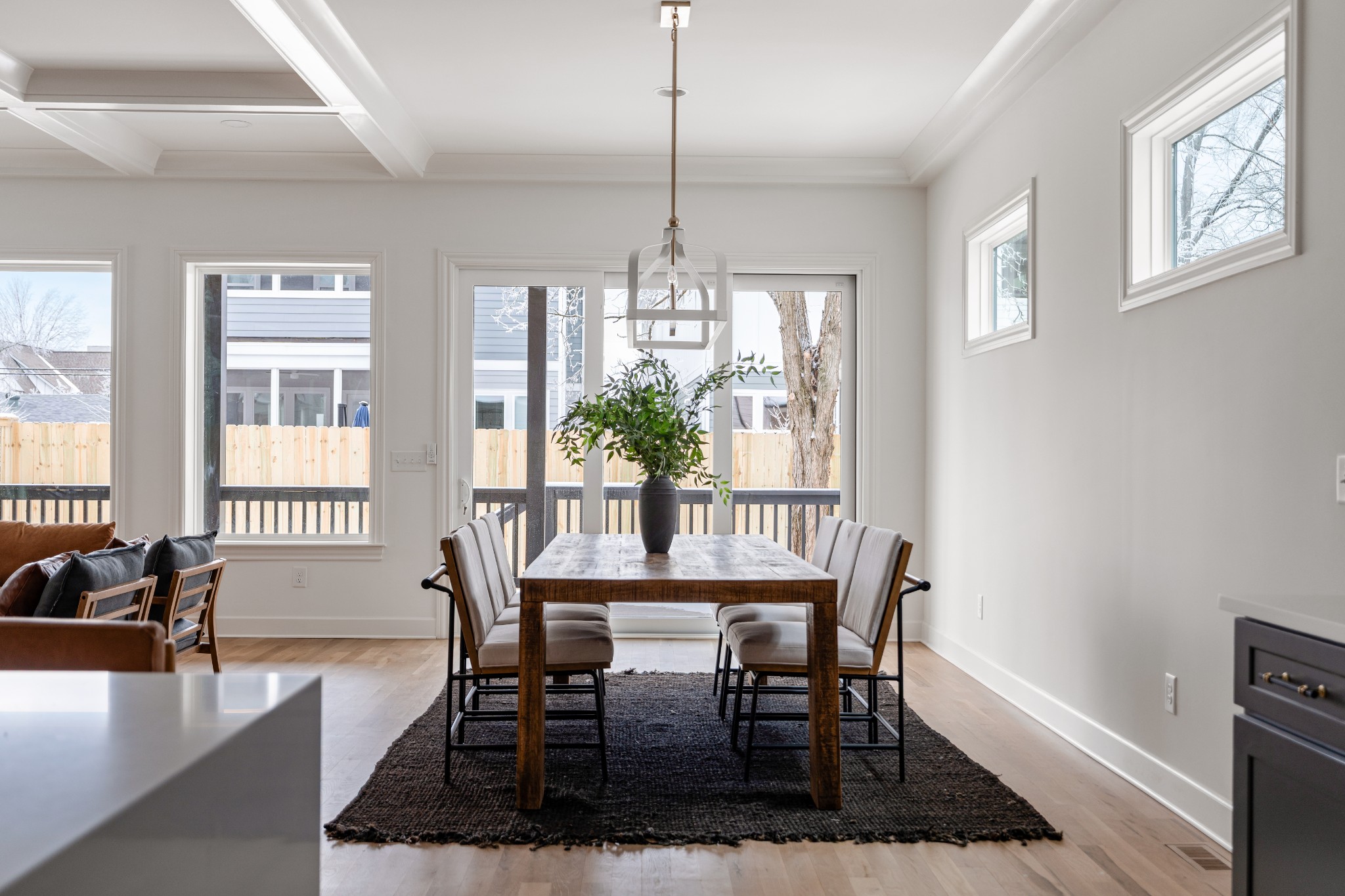 1037 Mitchell Road, Unit B Nashville, TN 37206 - Photo 24 of 51 a dining room with furniture a chandelier and wooden floor