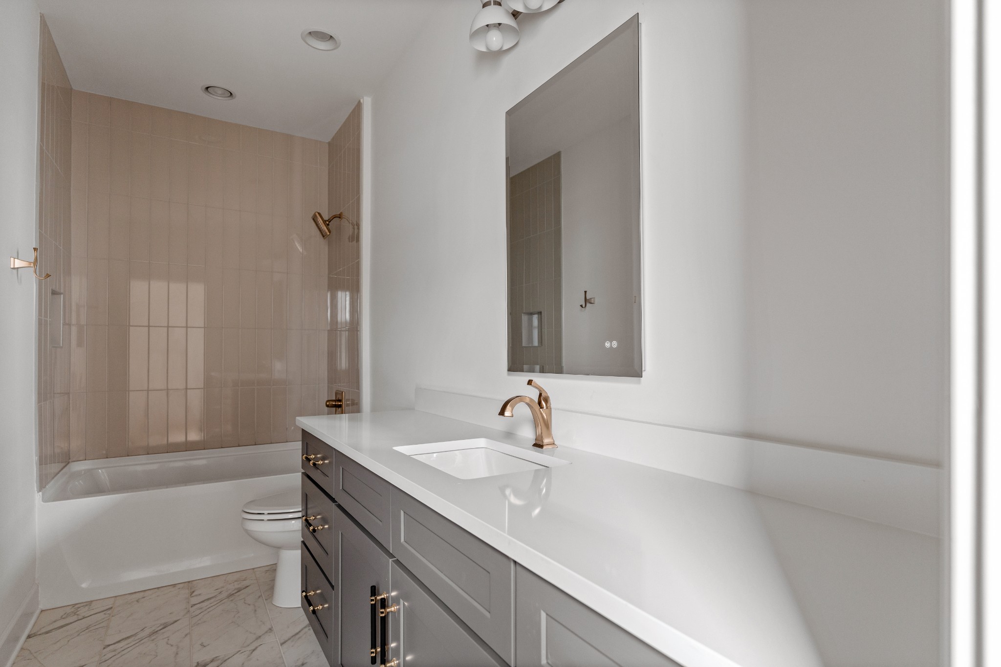 1037 Mitchell Road, Unit B Nashville, TN 37206 - Photo 28 of 50 a bathroom with a sink and a bathtub