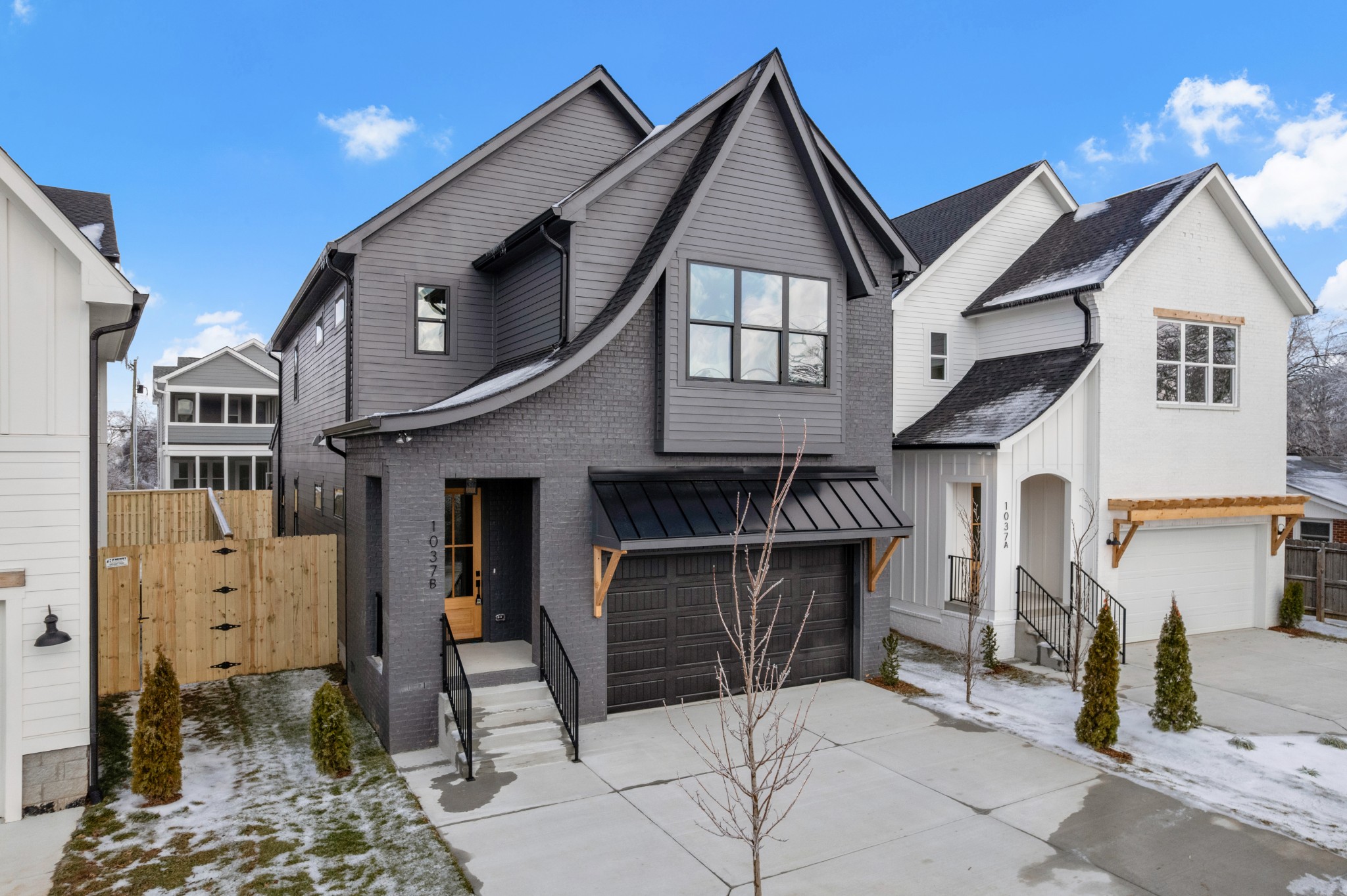 1037 Mitchell Road, Unit B Nashville, TN 37206 - Photo 3 of 50 a front view of a house with a yard