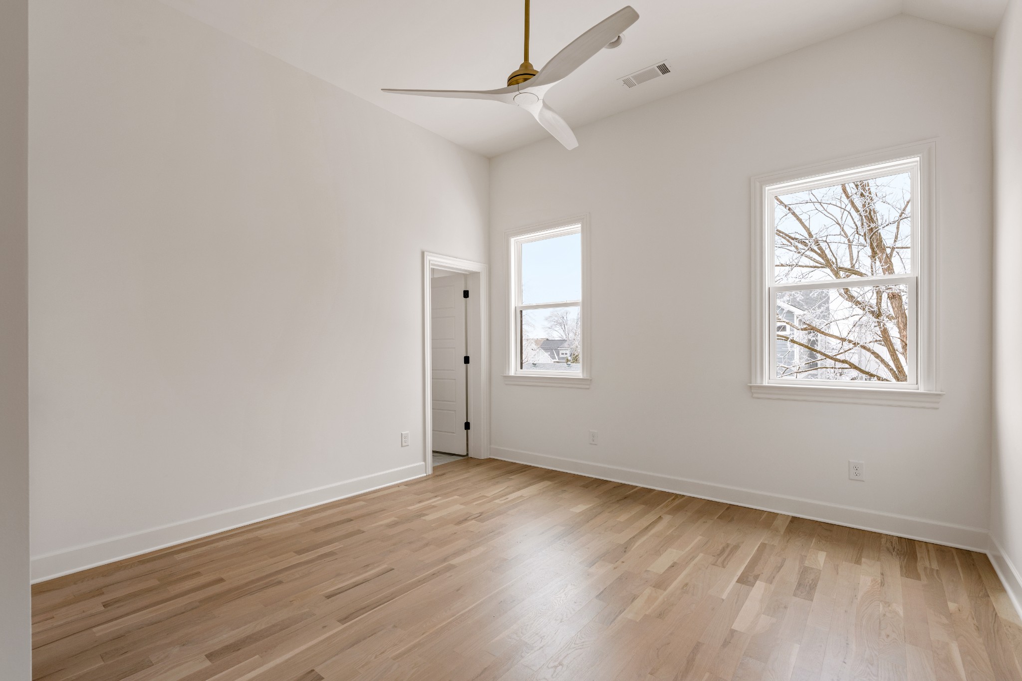 1037 Mitchell Road, Unit B Nashville, TN 37206 - Photo 31 of 51 wooden floor in an empty room with a window