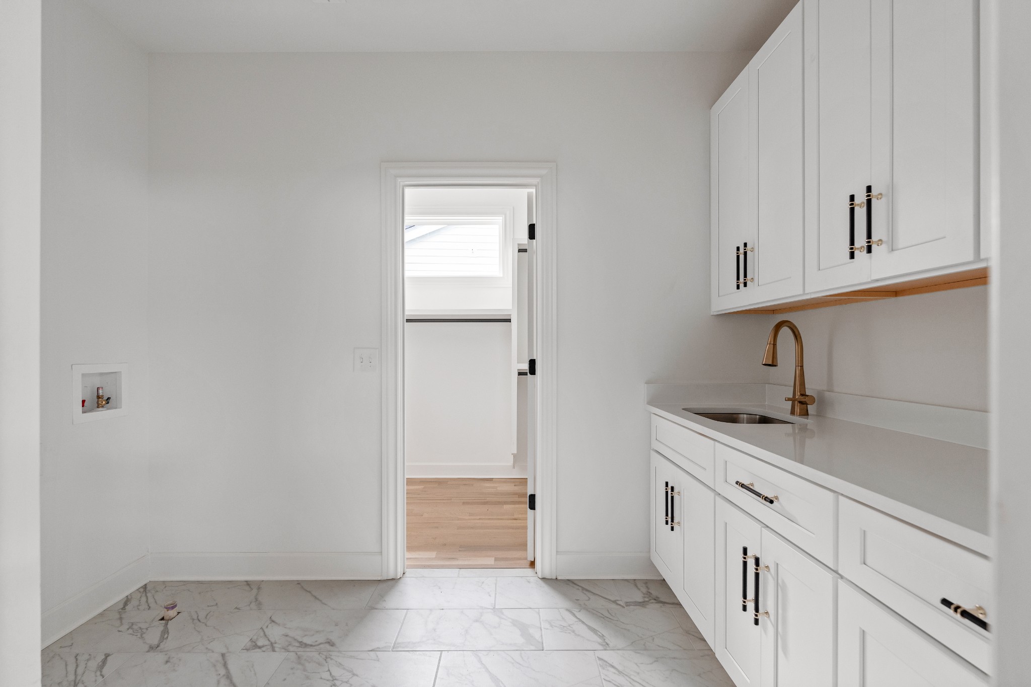 1037 Mitchell Road, Unit B Nashville, TN 37206 - Photo 35 of 50 a view of a kitchen with white cabinets