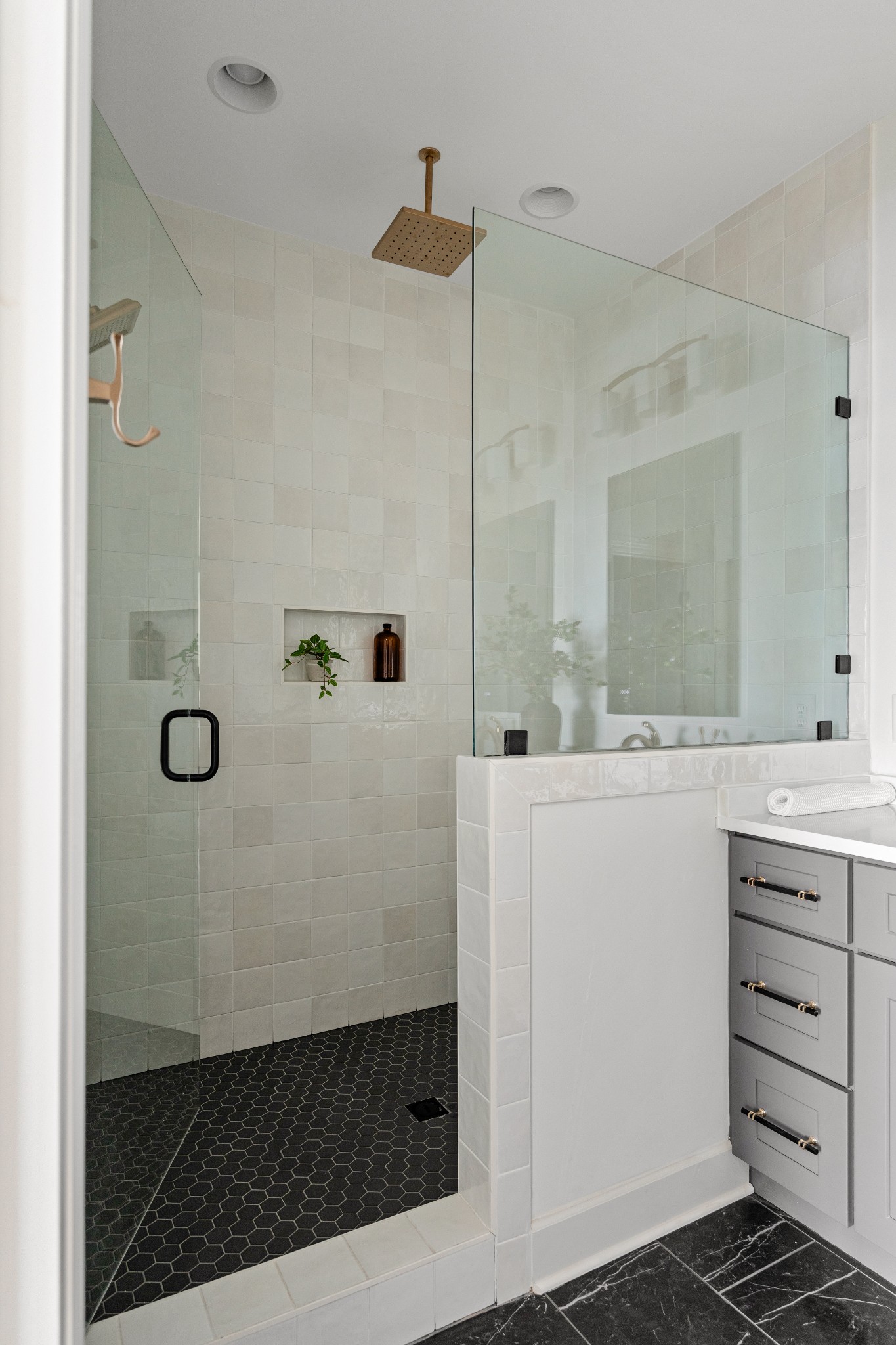1037 Mitchell Road, Unit B Nashville, TN 37206 - Photo 43 of 51 a bathroom with a sink a mirror and shower