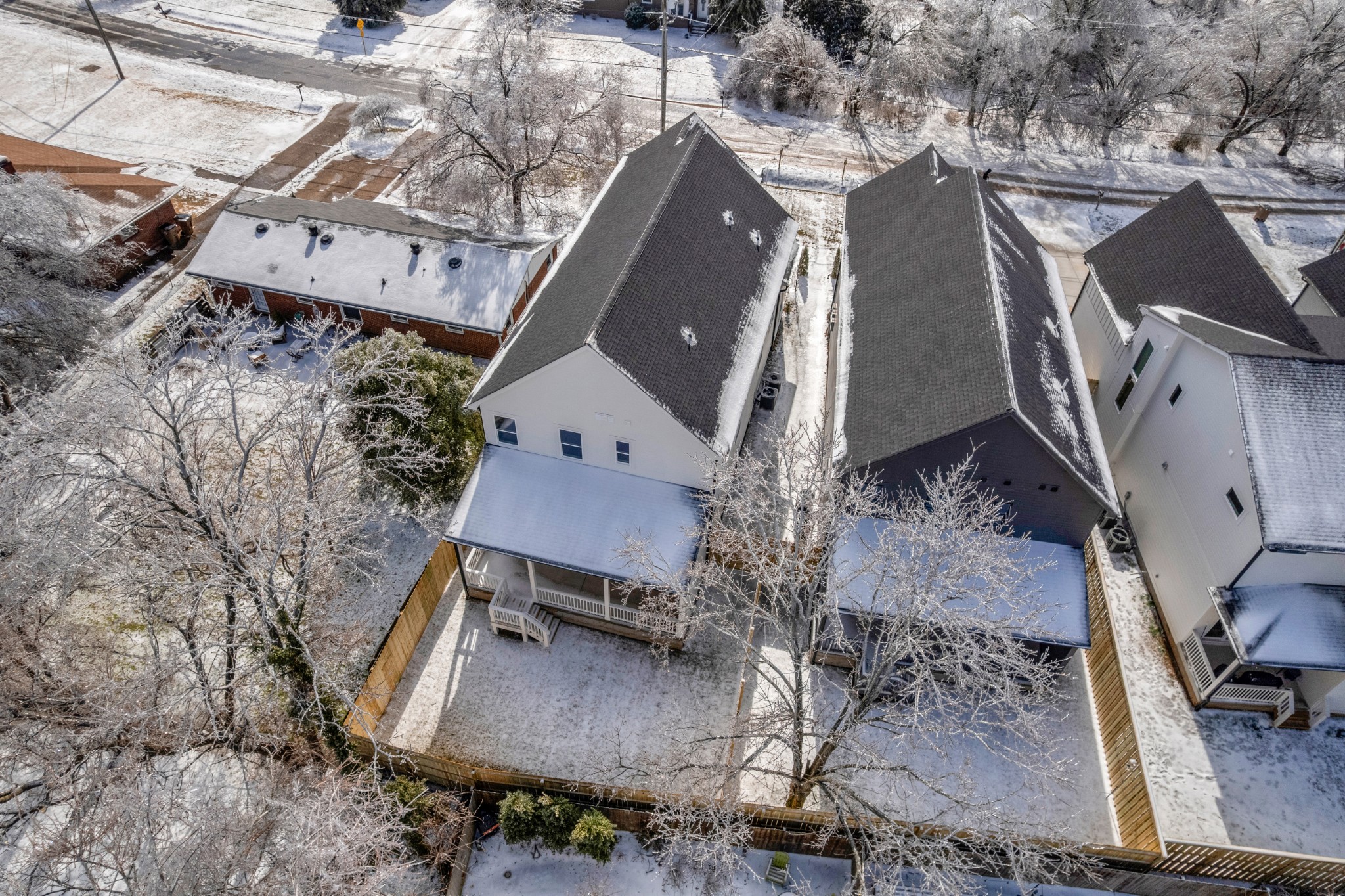 1037 Mitchell Road, Unit B Nashville, TN 37206 - Photo 46 of 50 a aerial view of a house with a yard and large trees