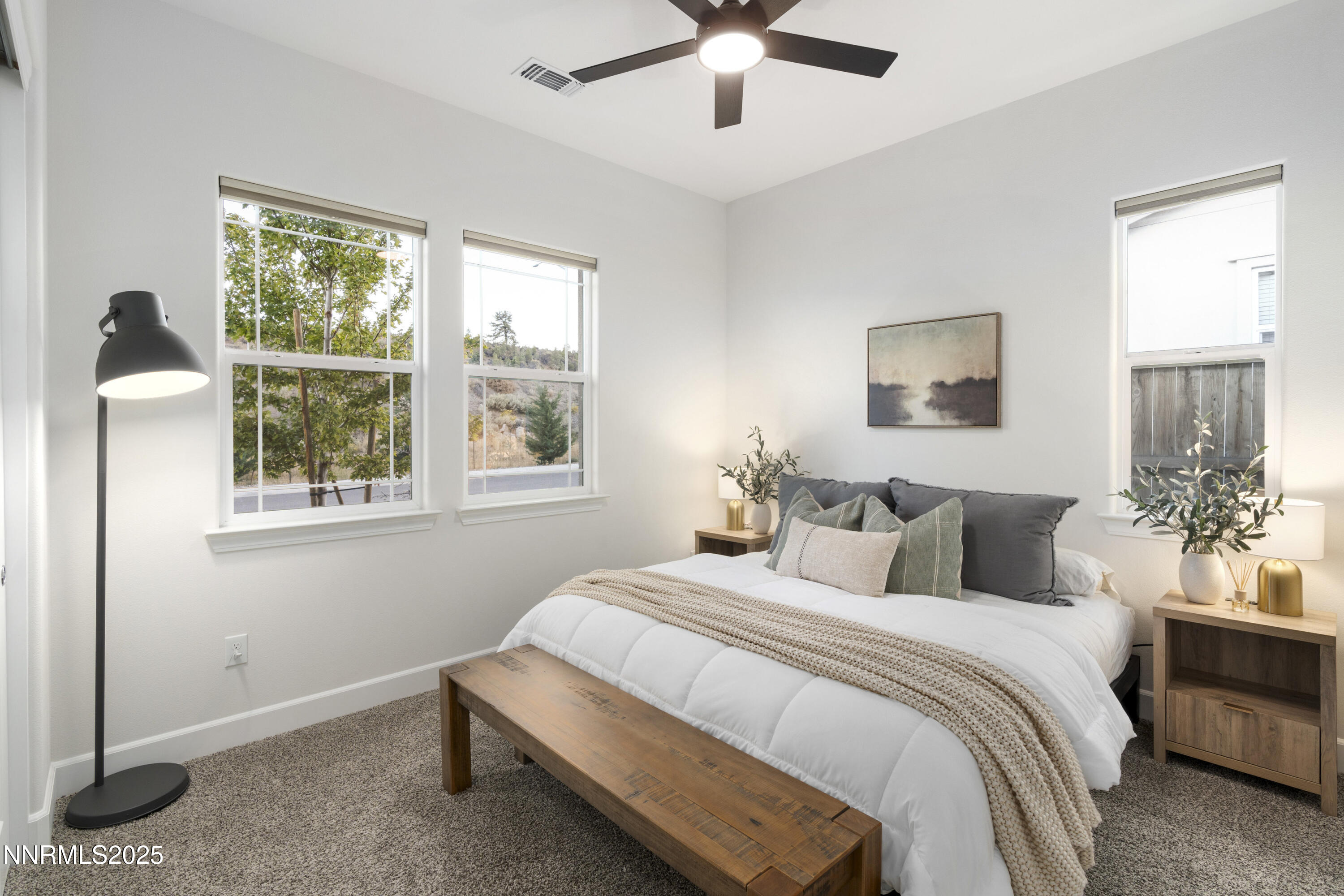 247 Starboard Drive Verdi, NV 89439 - Photo 14 of 41 a bedroom with a large bed and a window