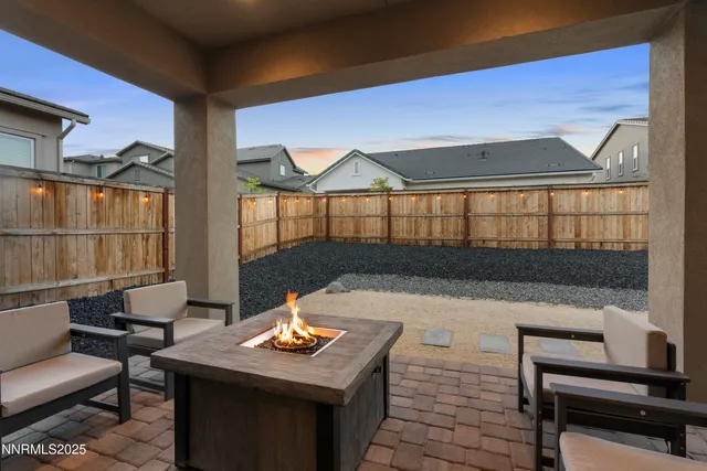 a view of a terrace with seating area