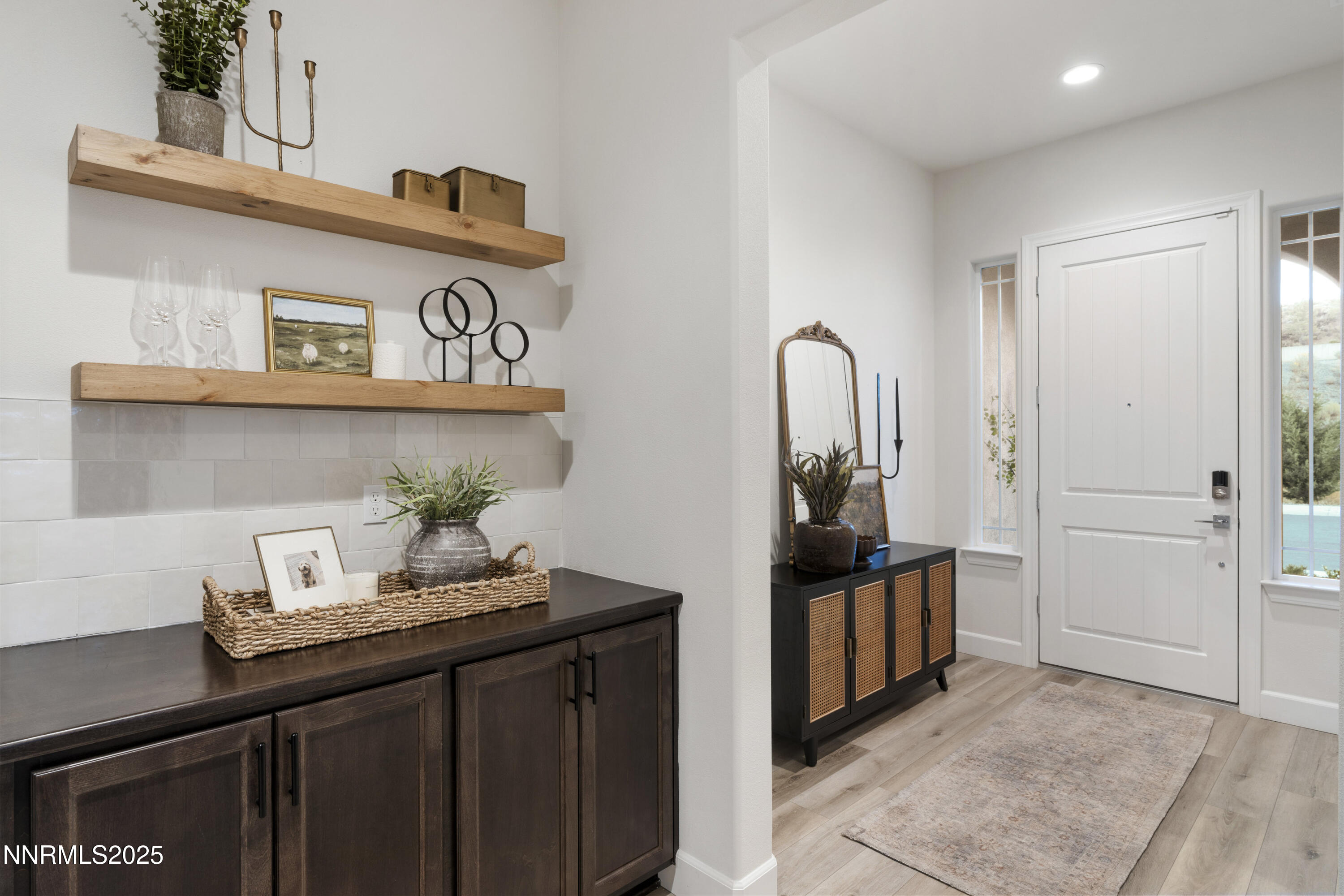 247 Starboard Drive Verdi, NV 89439 - Photo 3 of 41 a view of a hallway to a livingroom with furniture
