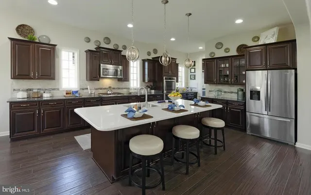 a large living room with a large tub