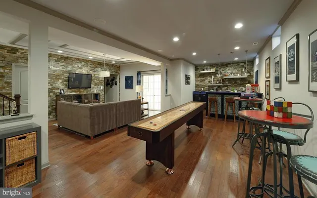 a front view of a house with yard and seating space