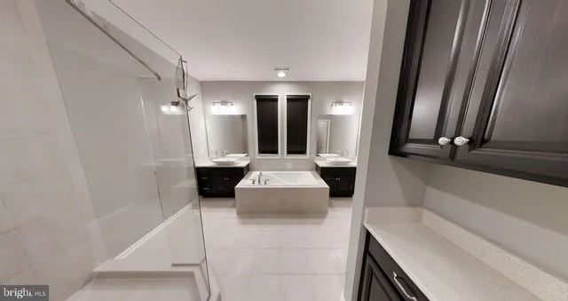 a living room with furniture a wooden floor and next to a window