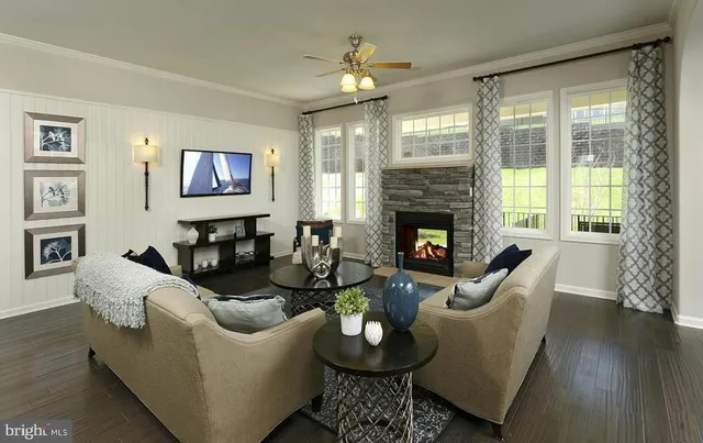 a view of a dining room and a table and chairs in the room
