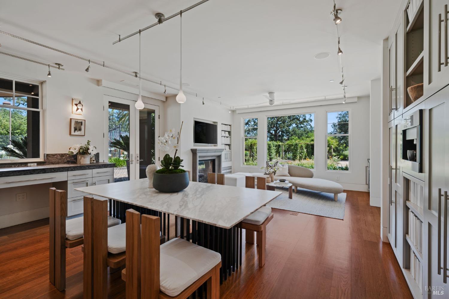 2000 Atlas Peak Road Napa, CA 94558 - Photo 21 of 80 a view of a dining room with furniture window and wooden floor