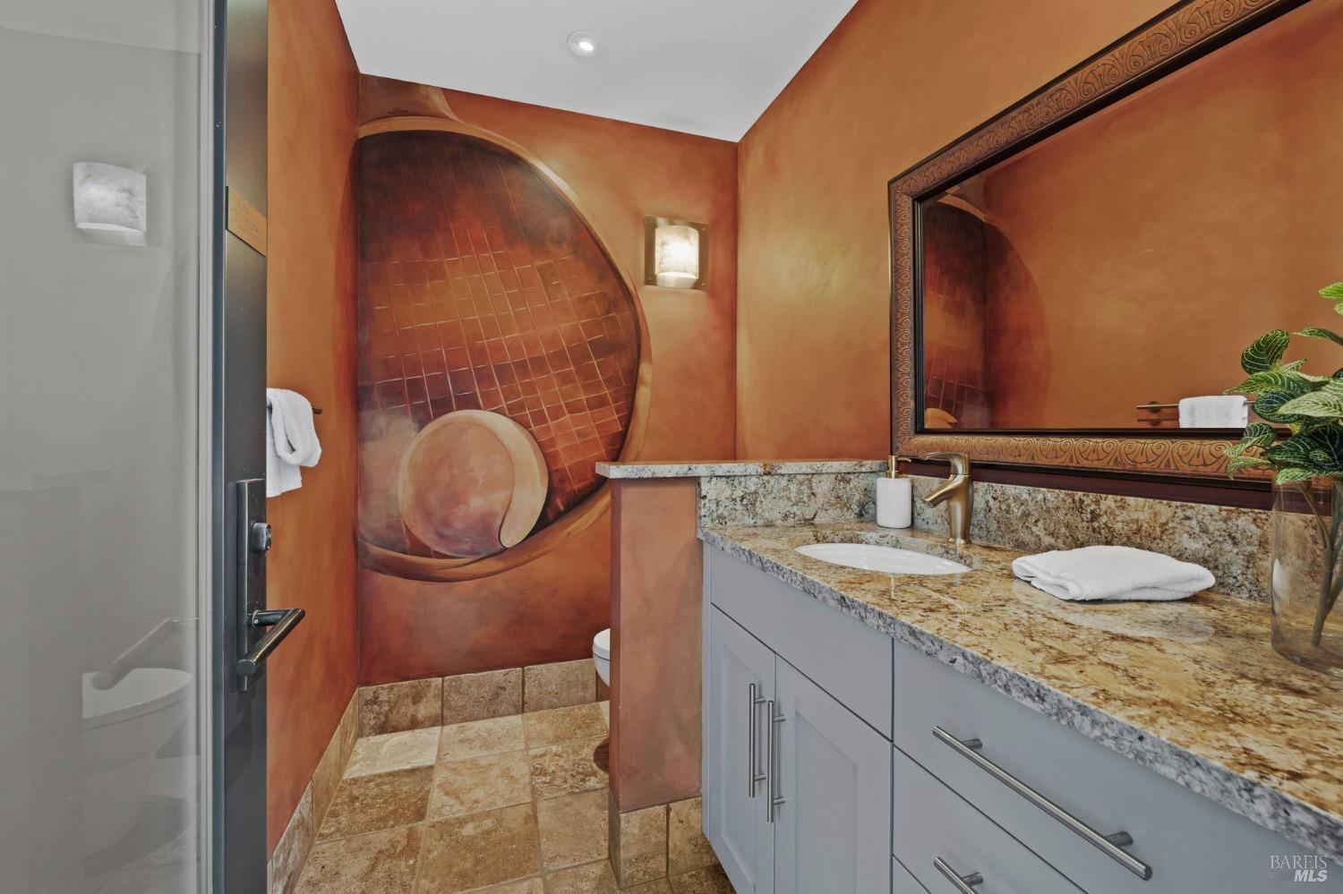 2000 Atlas Peak Road Napa, CA 94558 - Photo 46 of 80 a bathroom with a granite countertop double vanity sink and a mirror