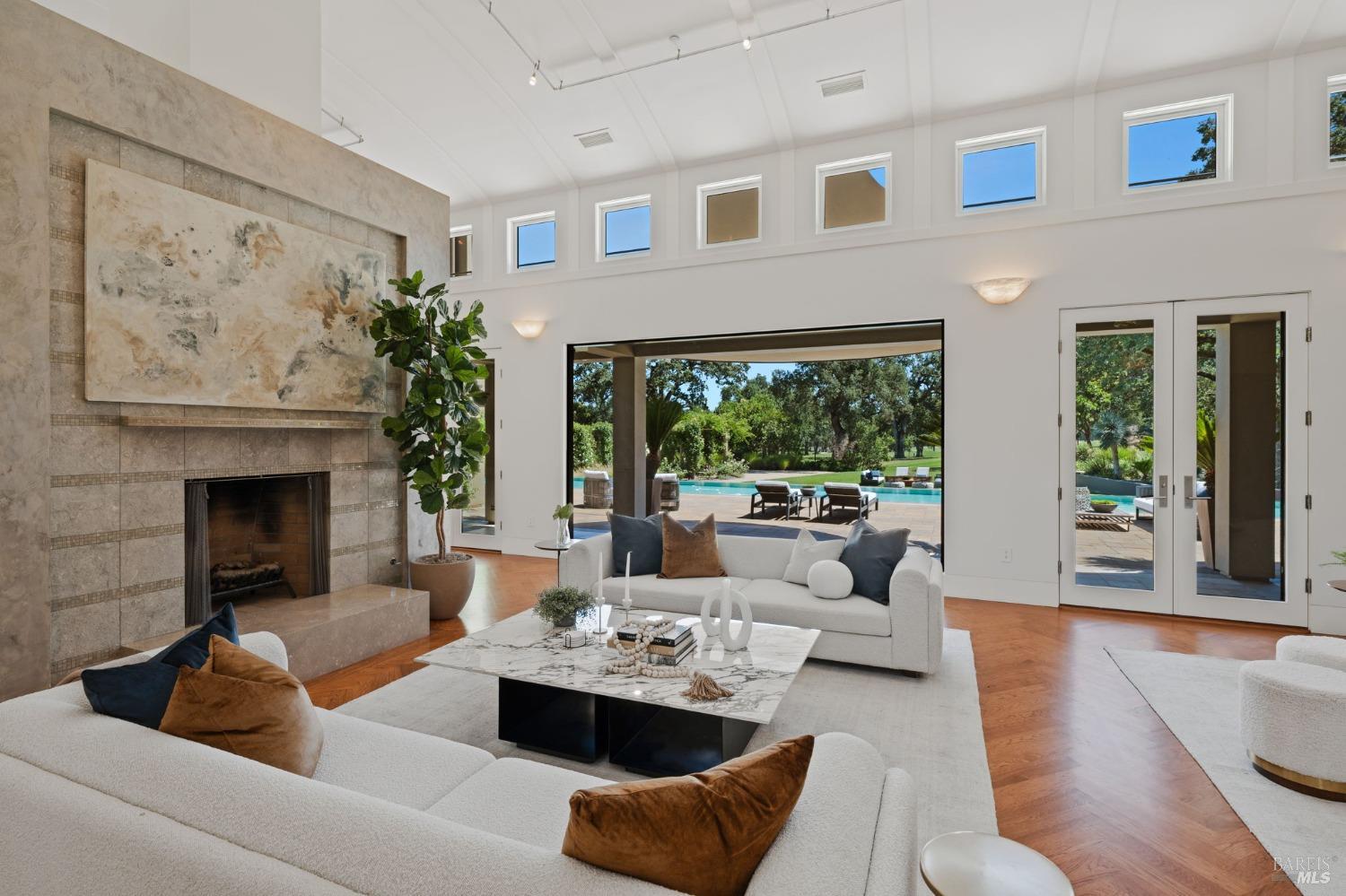 2000 Atlas Peak Road Napa, CA 94558 - Photo 6 of 80 a living room with furniture and a fireplace