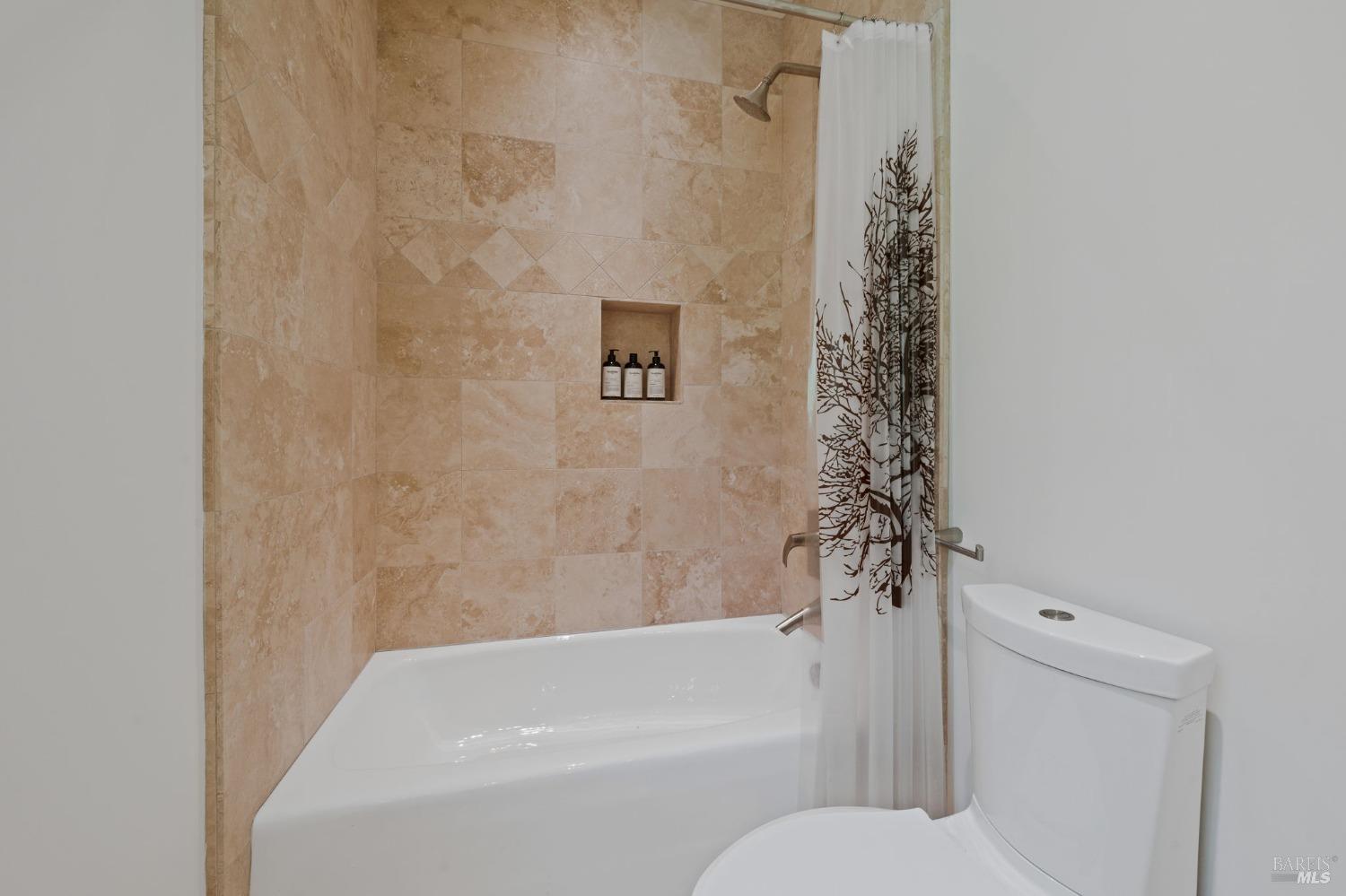 2000 Atlas Peak Road Napa, CA 94558 - Photo 64 of 80 a bathroom with a toilet and a bathtub