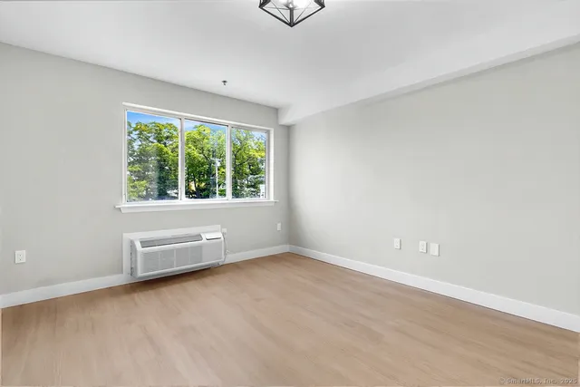 an empty room with windows
