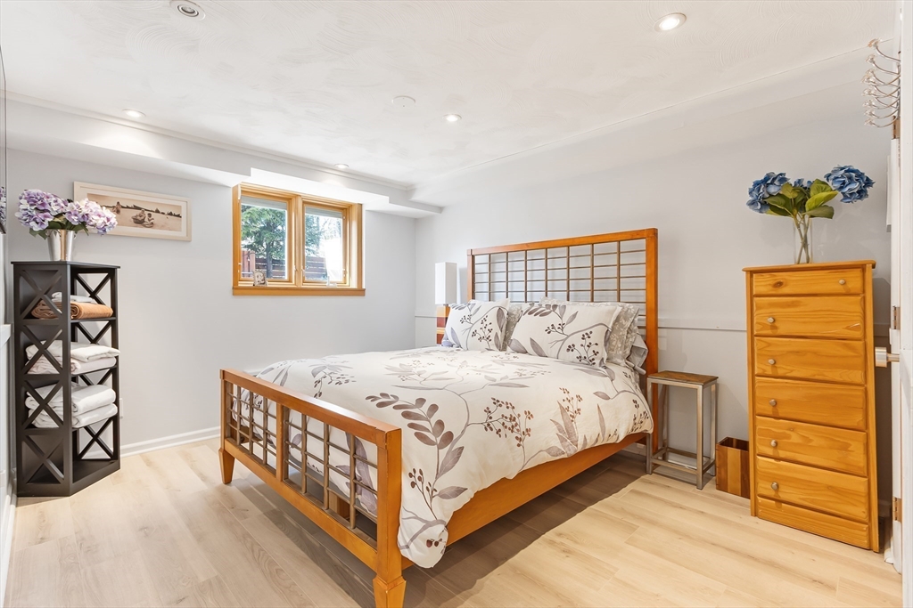 42 Fairhaven Road Newton, MA 02459 - Photo 23 of 38 a bedroom with a bed and a window