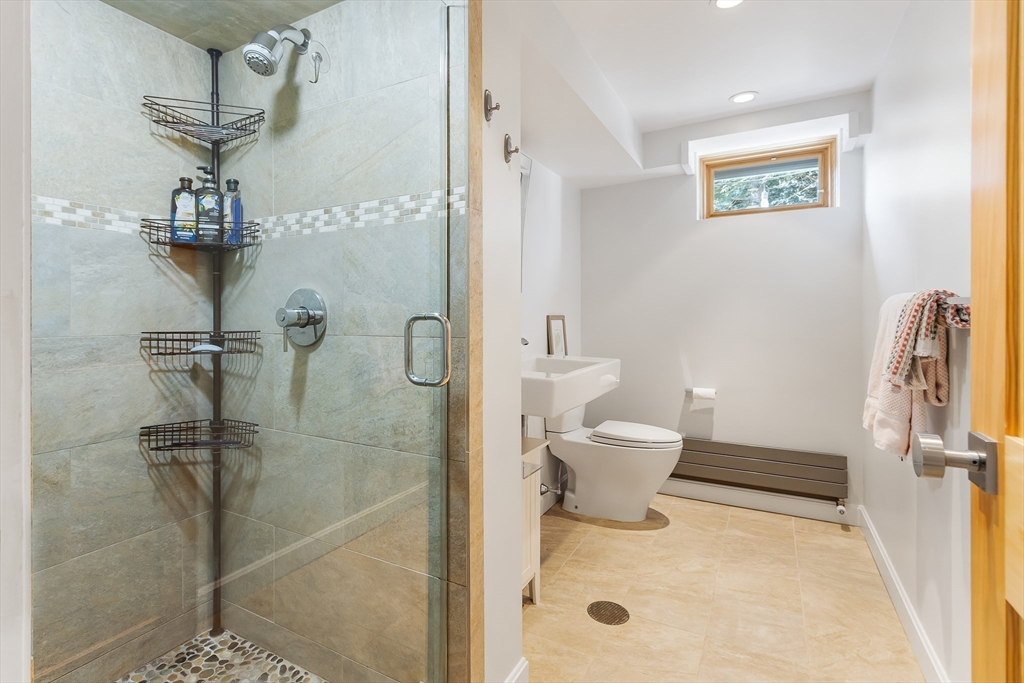 42 Fairhaven Road Newton, MA 02459 - Photo 24 of 38 a bathroom with a toilet and a shower