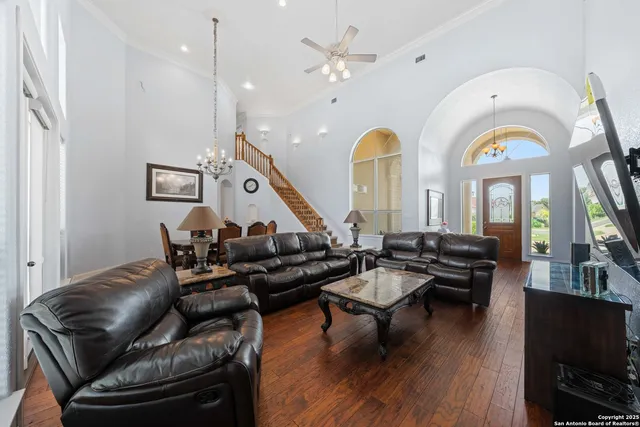 a large kitchen with a table and chairs