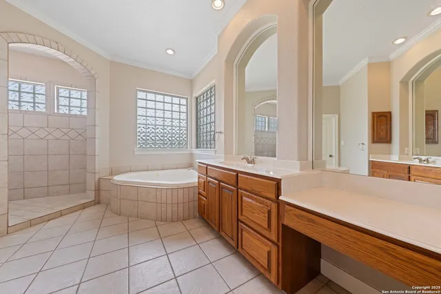 a view of a patio with a dining table and chairs