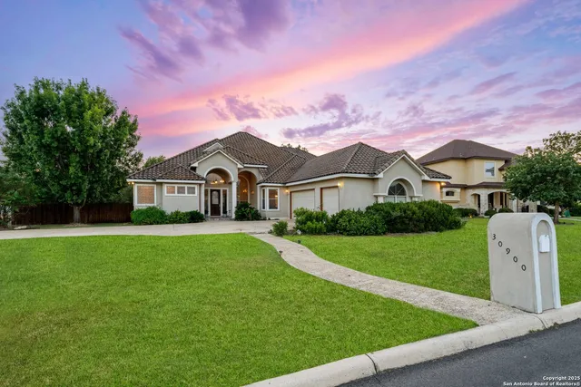 a view of a house with a big yard