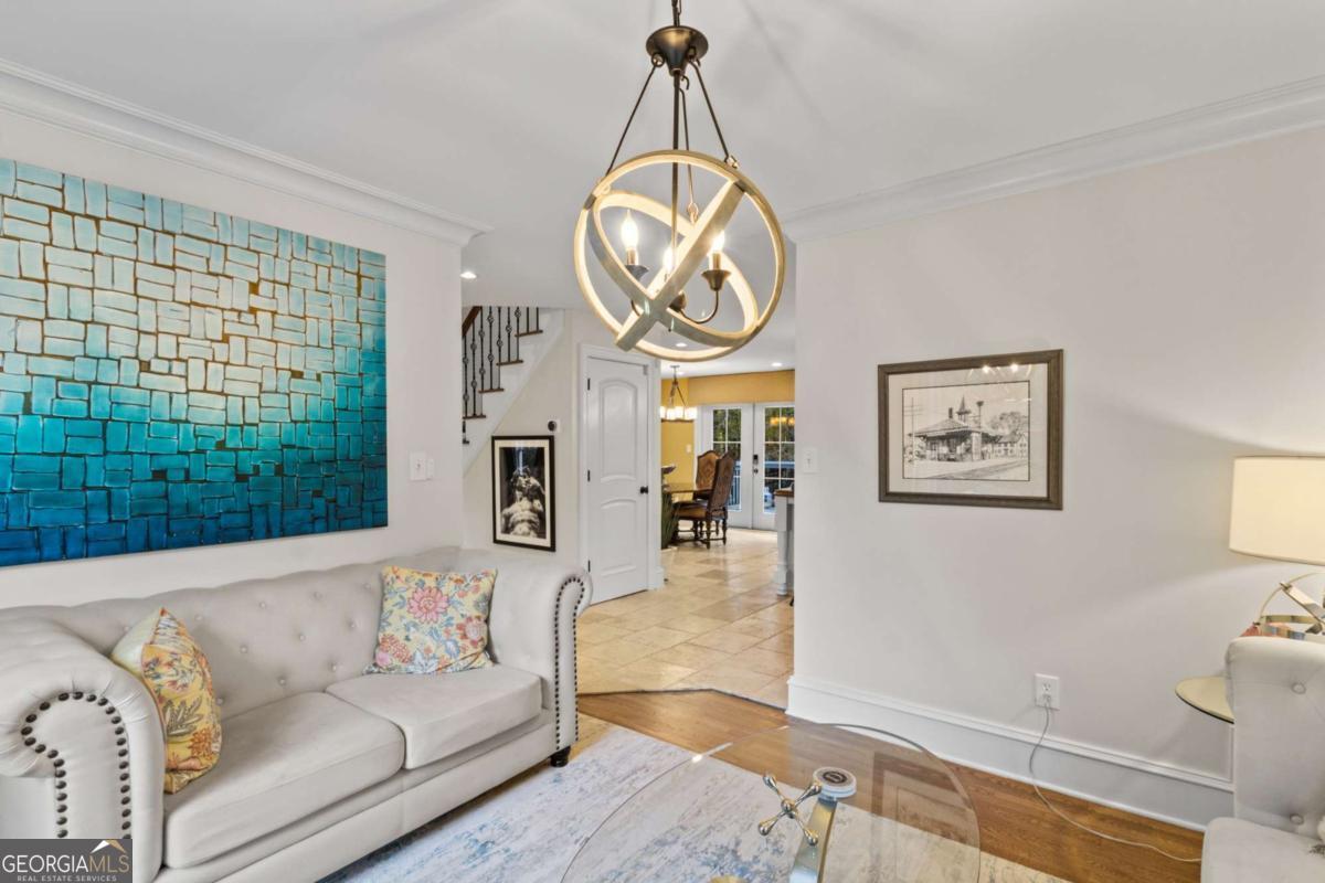 1532 Huntingdon Trail Atlanta, GA 30350 - Photo 11 of 68 a living room with furniture a window and a clock