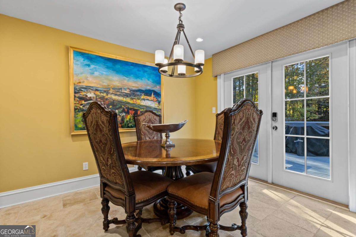 1532 Huntingdon Trail Atlanta, GA 30350 - Photo 14 of 68 a dining room with furniture and window