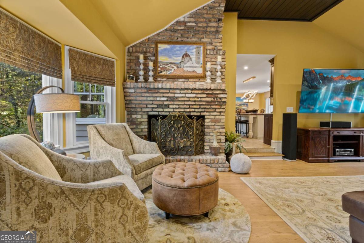 1532 Huntingdon Trail Atlanta, GA 30350 - Photo 23 of 68 a living room with furniture and a fireplace