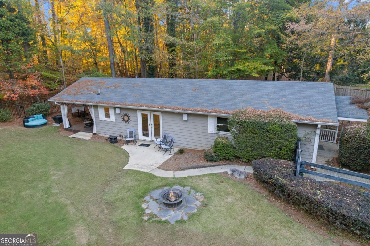 1532 Huntingdon Trail Atlanta, GA 30350 - Photo 43 of 68 a front view of a house with garden