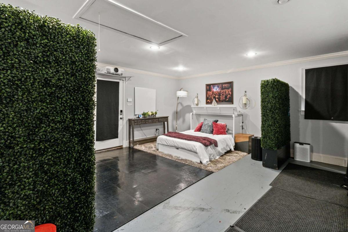 1532 Huntingdon Trail Atlanta, GA 30350 - Photo 46 of 68 a living room with furniture and a flat screen tv