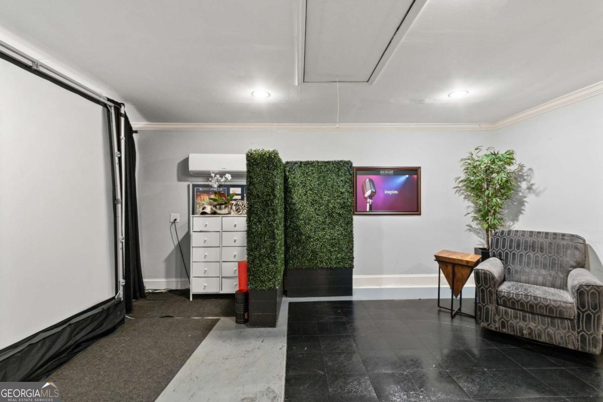 1532 Huntingdon Trail Atlanta, GA 30350 - Photo 47 of 68 a living room with furniture and a couch