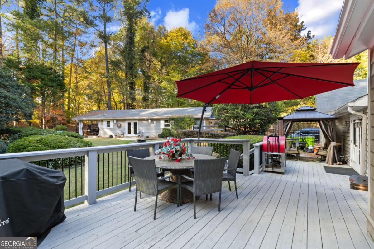1532 Huntingdon Trail Atlanta, GA 30350 - Photo 62 of 68 a view of house with deck and outdoor seating