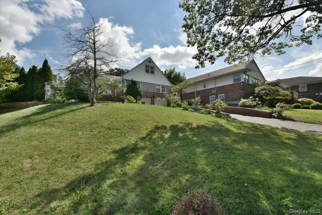 a view of a backyard with a patio
